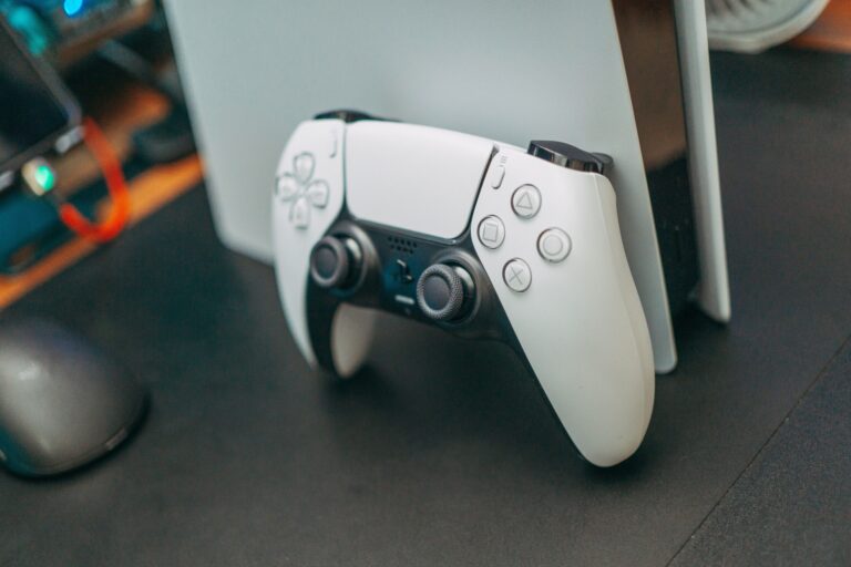 PlayStation 5 controller resting on the console, ready to play retro classics