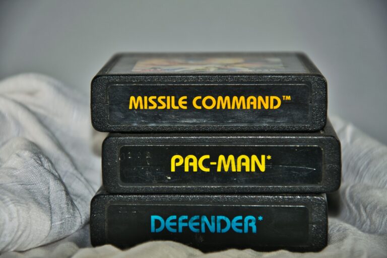Vintage Atari game cartridges for Missile Command, Pac-Man and Defender