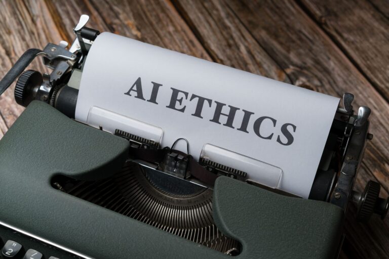 Macchina da scrivere con foglio su cui ĆØ scritto AI Ethics: etica e copyright dei contenuti generati dall'intelligenza artificiale