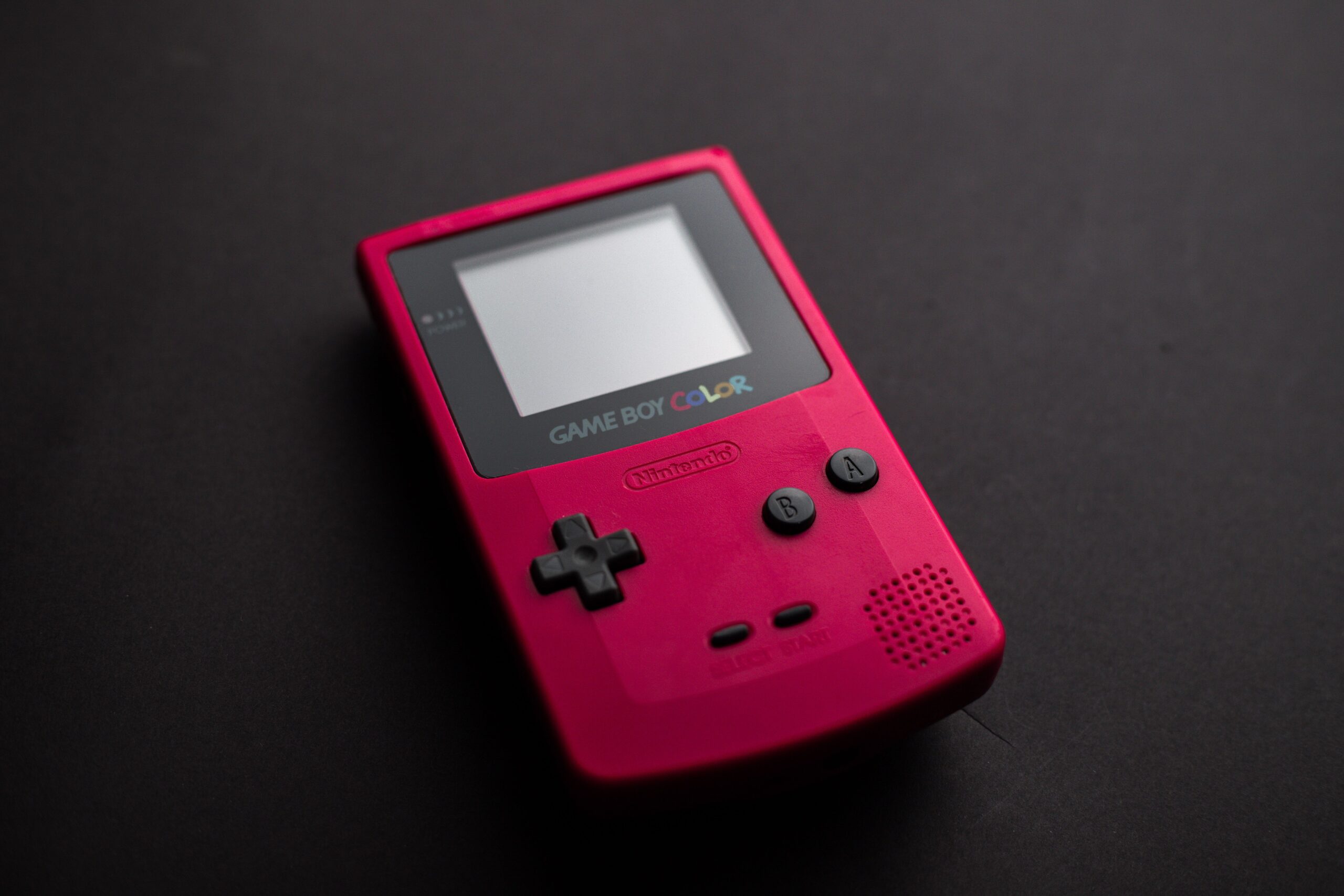 Red Nintendo Game Boy Color handheld console close-up