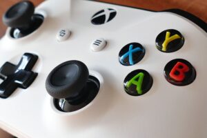 Xbox controller on a couch while playing retro games