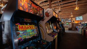 Retro arcade cabinets with joysticks and control panels, the classic home arcade experience
