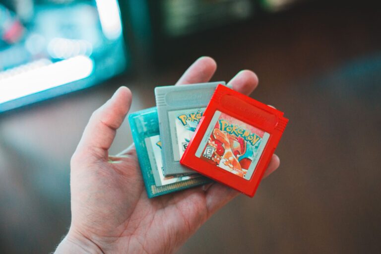 Hands holding retro video game cartridges, EverDrive flash cartridge guide